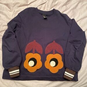 Mother of Pearl sweatshirt with flower appliqués